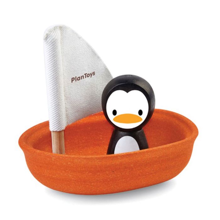 Barca a vela galleggiante con pinguino main product photo